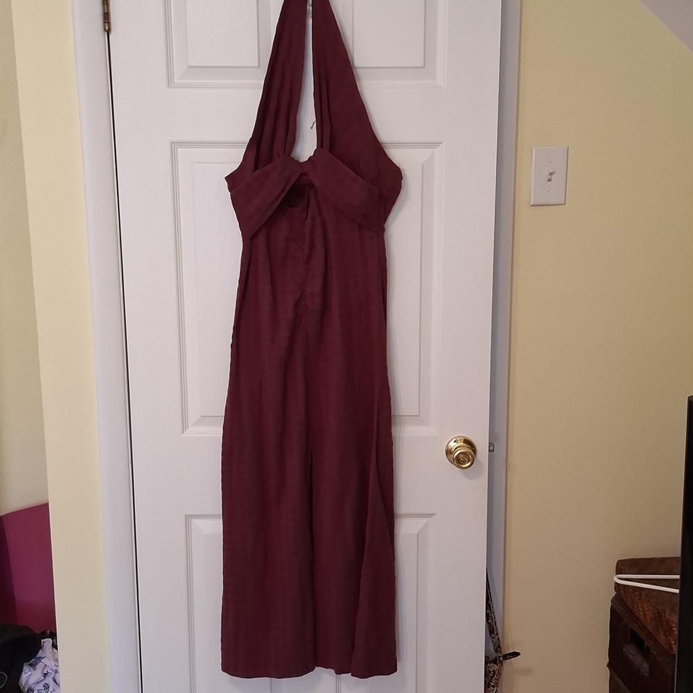 Free People sz Sn (fits M), NYA maxi dress in color Wild Garnet. Deep halter. NW